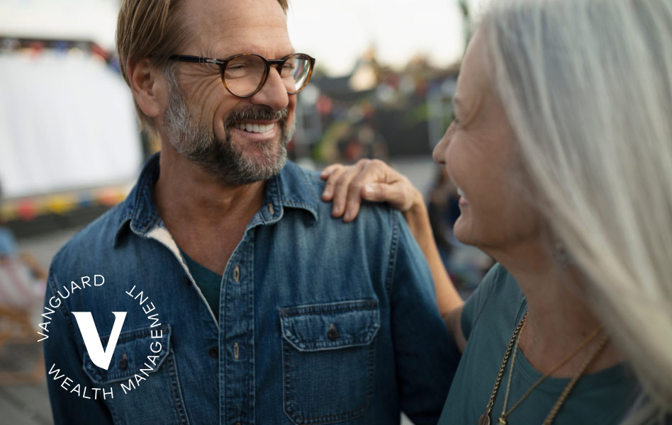 Man and women smiling at each other.