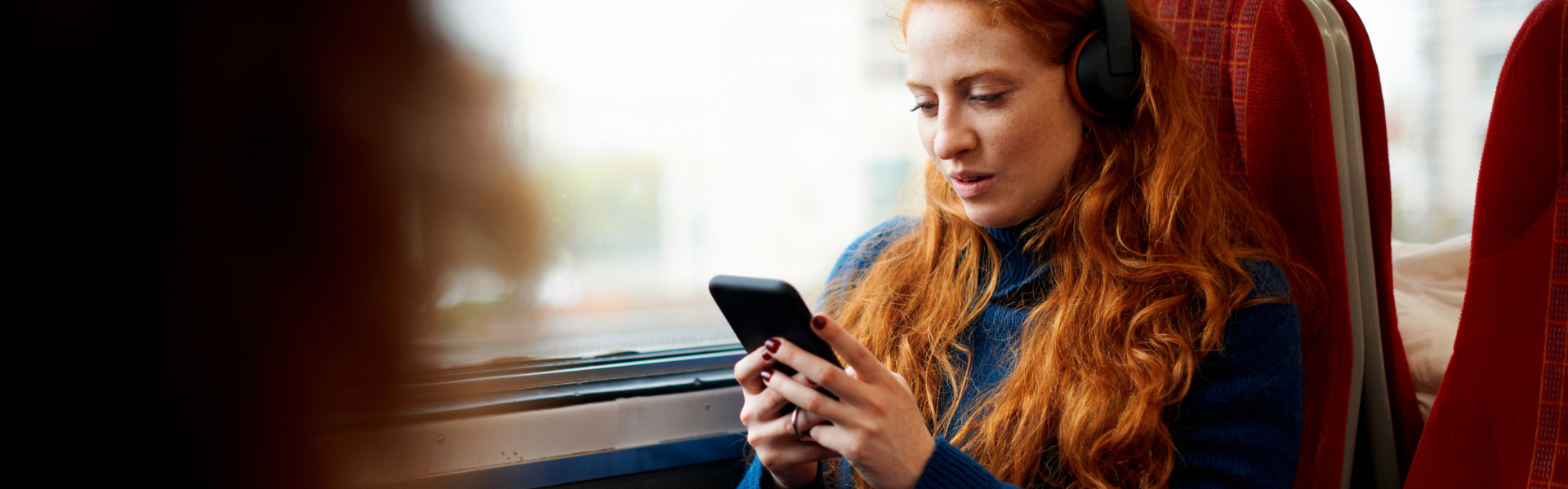 A woman is hugging a dog.	